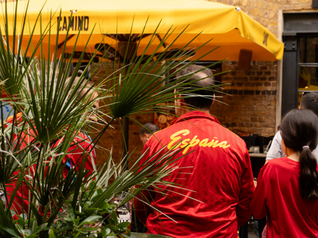 A person wearing a red jacket with 